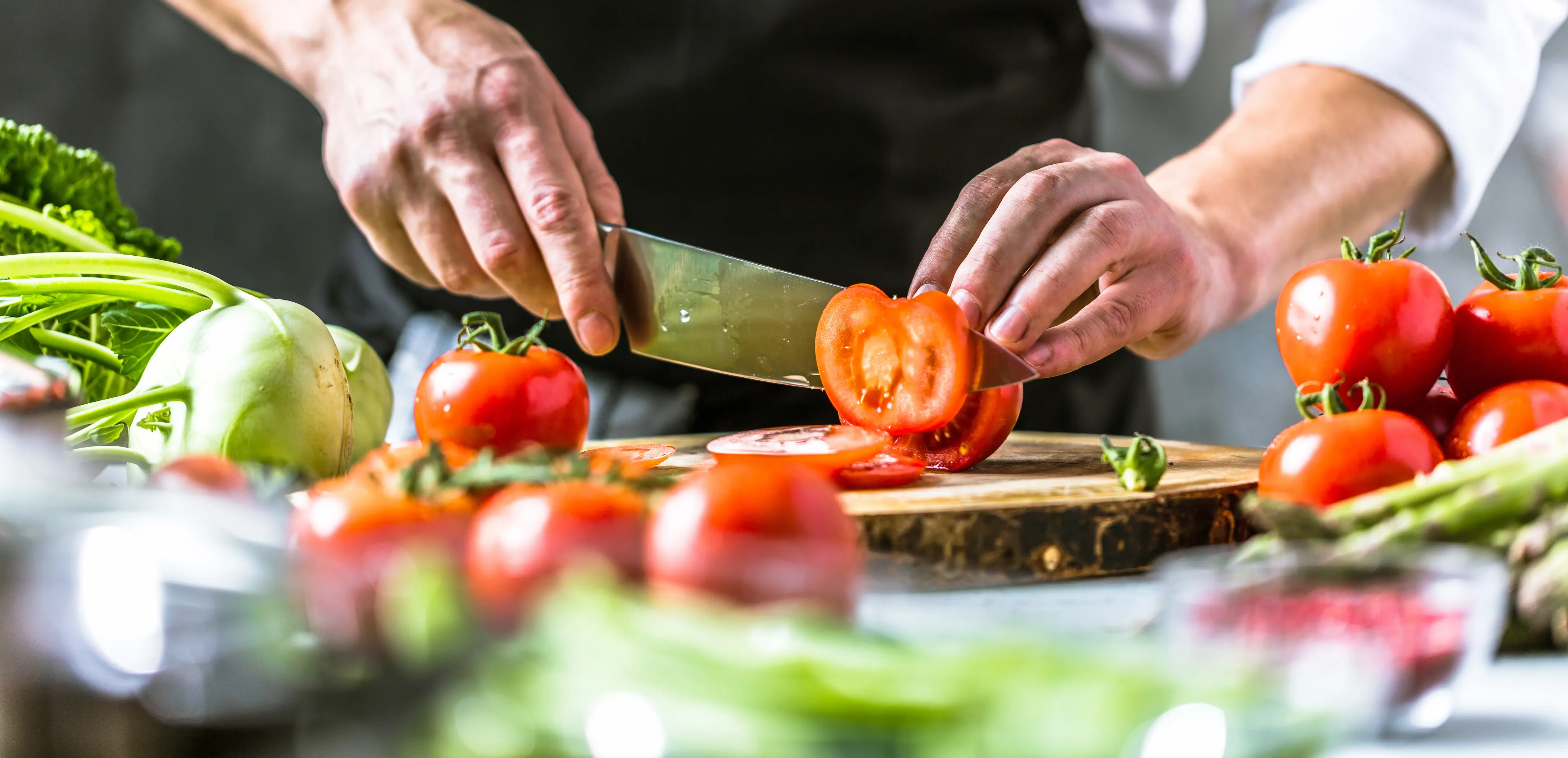 Stock image of chef chopping up ingredients